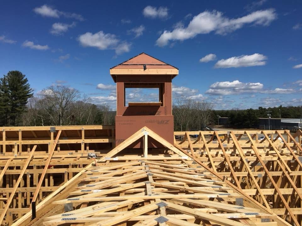 Commercial roof trusses framed by Uncle Dino Construction in Central Virginia